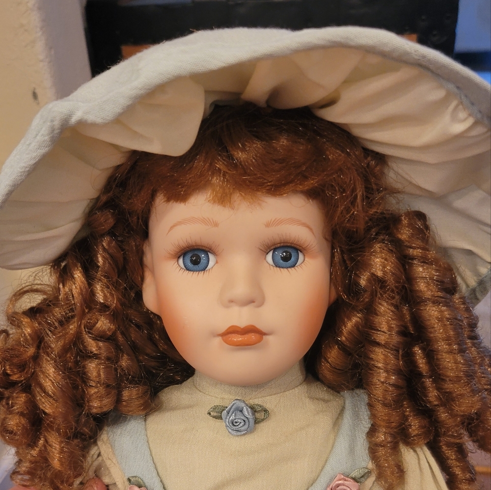 Vintage 21 inch Porcelain Doll with Light Brown Hair and Blue eyes